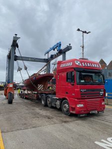 Spray being lifted on to the Sealand lorry.