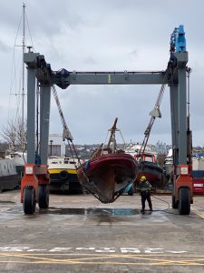 Spray being transported to the awaiting lorry.